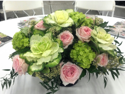 green and pink flower arrangement